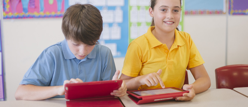 “students-using-ipad-in-classroom“