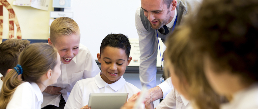 “students-at-desk-in-classroom“