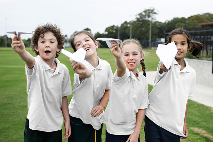 Students with paper planes